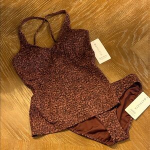Athleta tankini top and bottom 
Triangle Tankini D-DD
Clean medium bottom